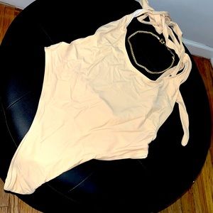 New beige/ nude one piece strappy swimsuit/style as halter/ wrap around waist
